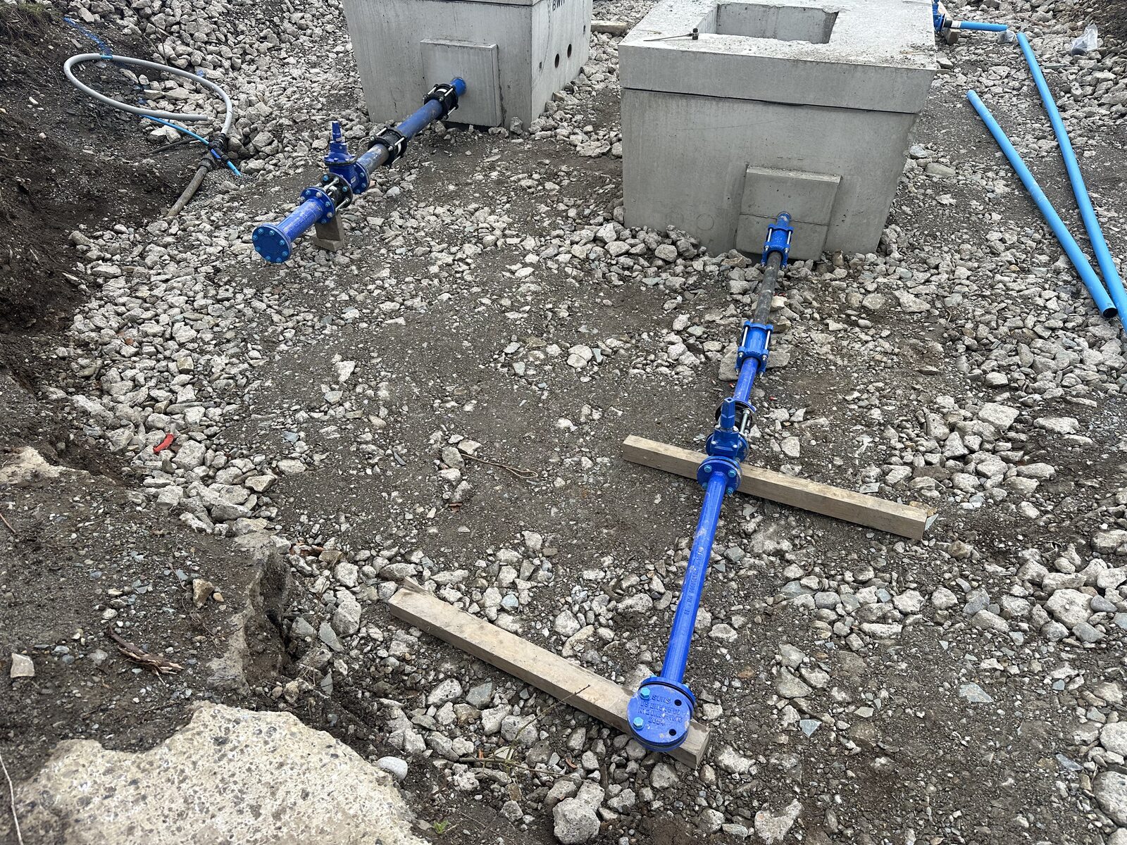 Water main valve chambers with ductile iron and HDPE pipework